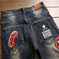 Men’s Distressed Jeans with Badge Detail